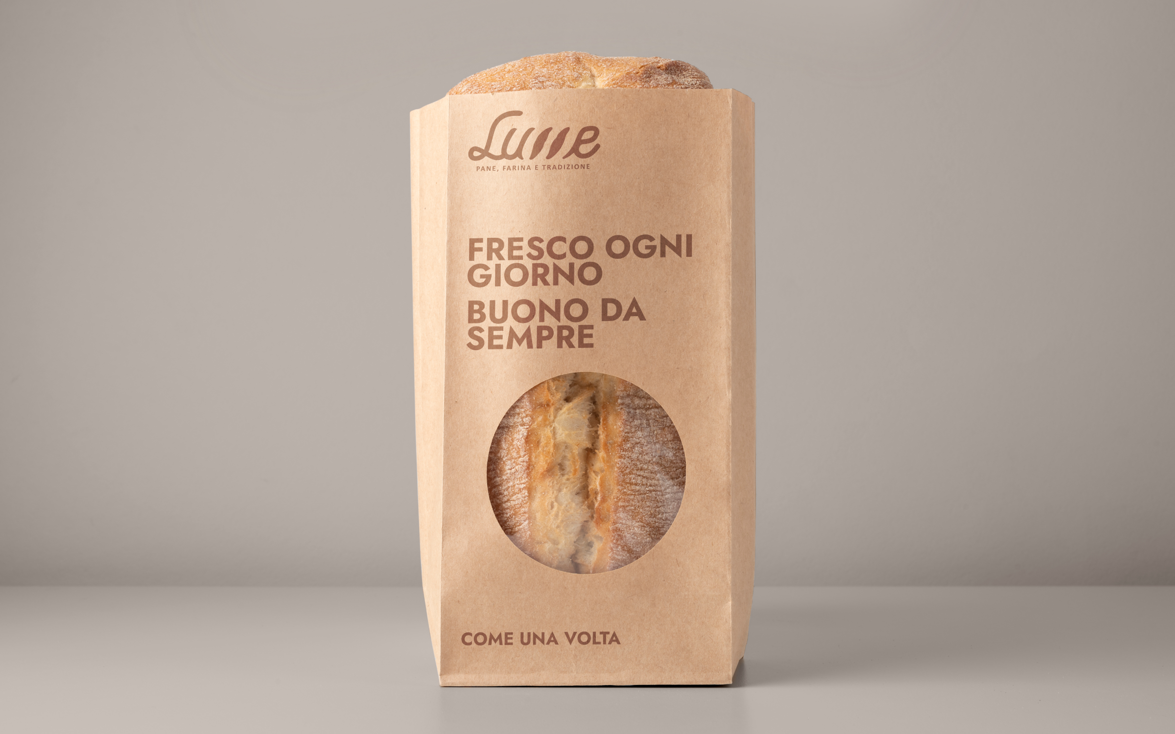 Sacchetto del pane Lume con logo e scritta “Fresco ogni giorno, buono da sempre”.